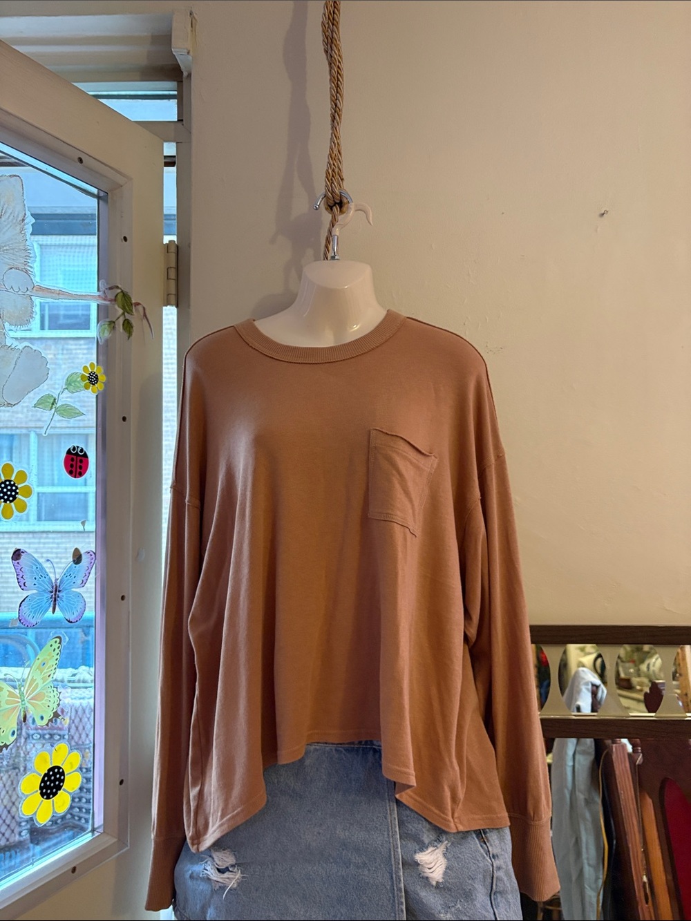 aerie Oversized Long-Sleeve Pocket Top in Dusty Rose Brown. Cotton Model